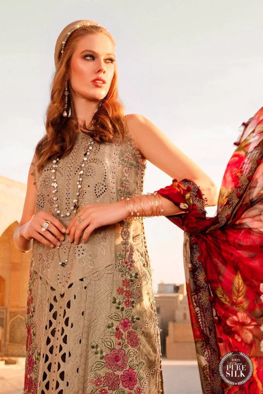 Model showcasing elegant Pakistani attire with floral embroidery and vibrant dupatta, perfect for summer occasions.