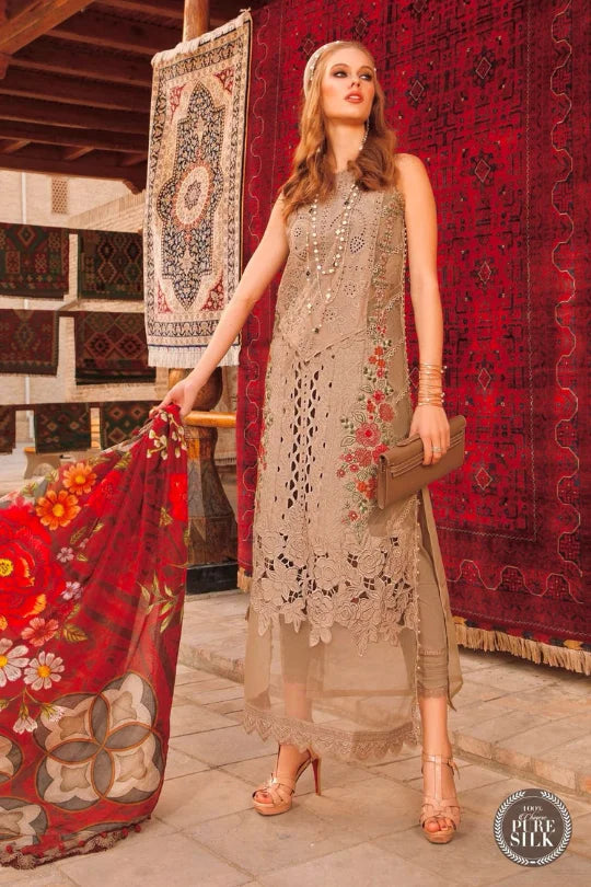 Elegant woman wearing a traditional summer dress, holding a vibrant dupatta, with intricate embroidery and soft hues.