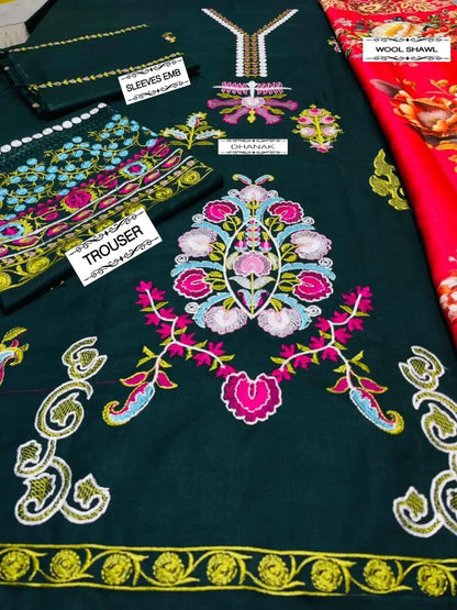 Detailed embroidery designs on green fabric showcasing wedding winter collection items like sleeves, trouser, and wool shawl.