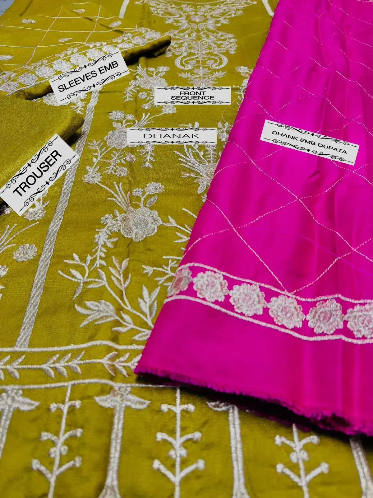 Close-up of ASIM JOFA wedding outfit components: embellished sleeves, trouser, and vibrant pink embroidered dupatta.